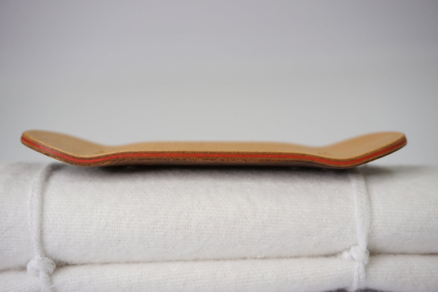 Univerque Fingerboard Deck - TraWoo Camphor Root 006 - mc_wb43_w34, symmetrical