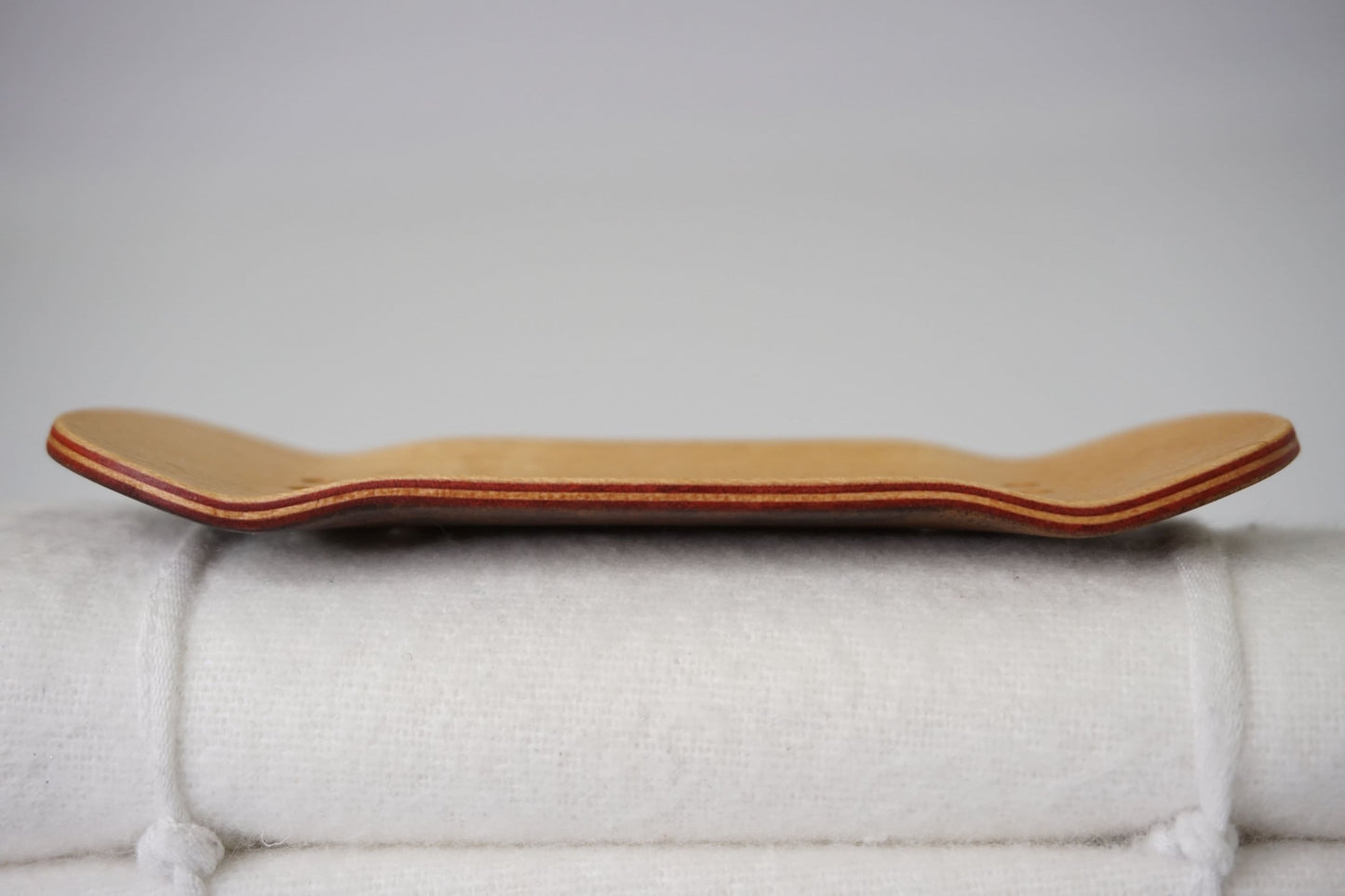 Univerque Fingerboard Deck - TraWoo Camphor Root 007 - hc_wb43_w34, symmetrical