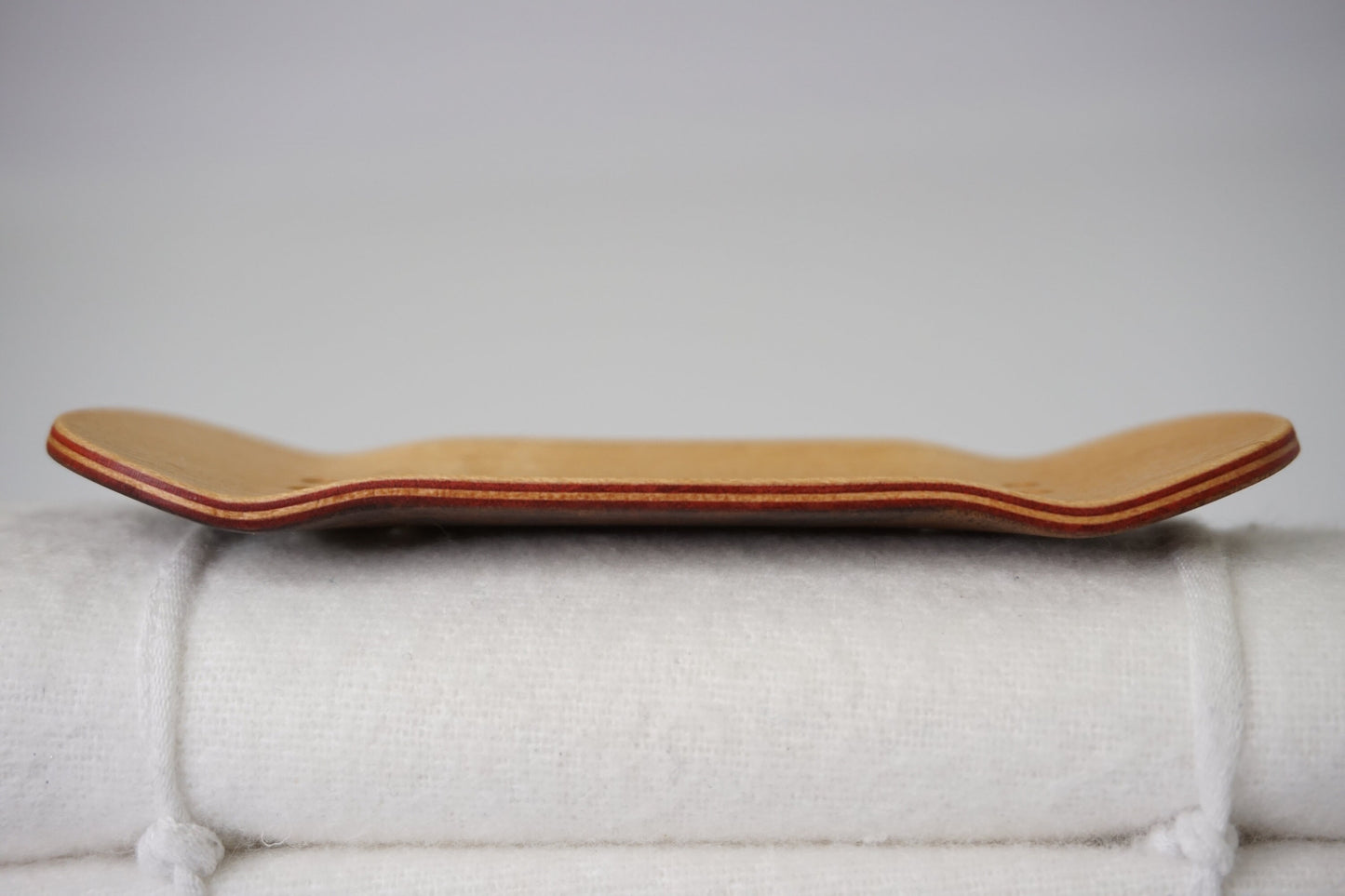 Univerque Fingerboard Deck - TraWoo Camphor Root 007 - hc_wb43_w34, symmetrical