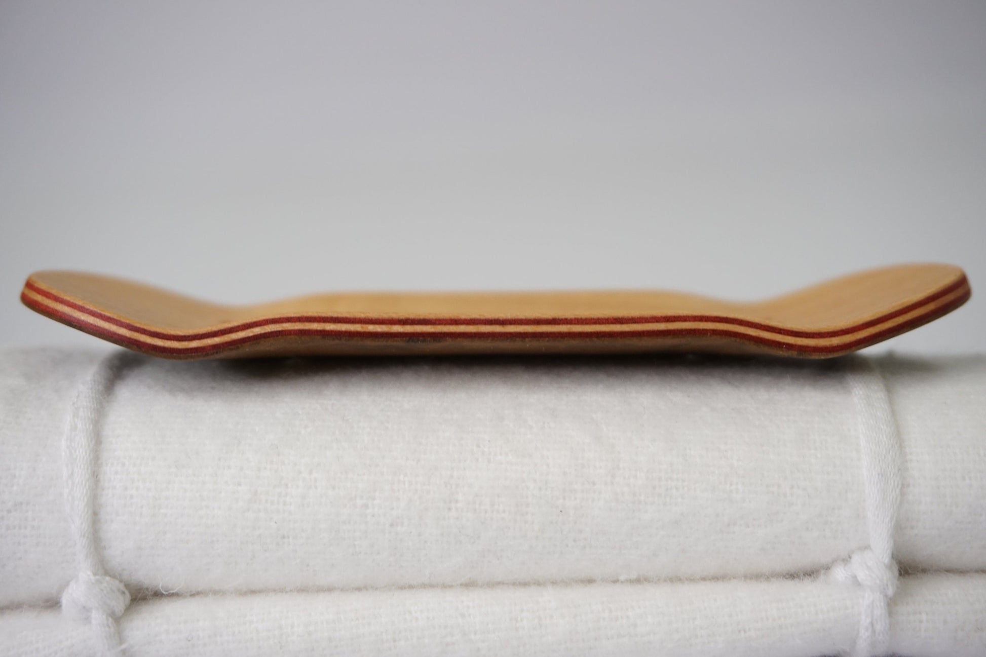 Univerque Fingerboard Deck - TraWoo Myrtle Root 001 - hc_wb43_w34, symmetrical