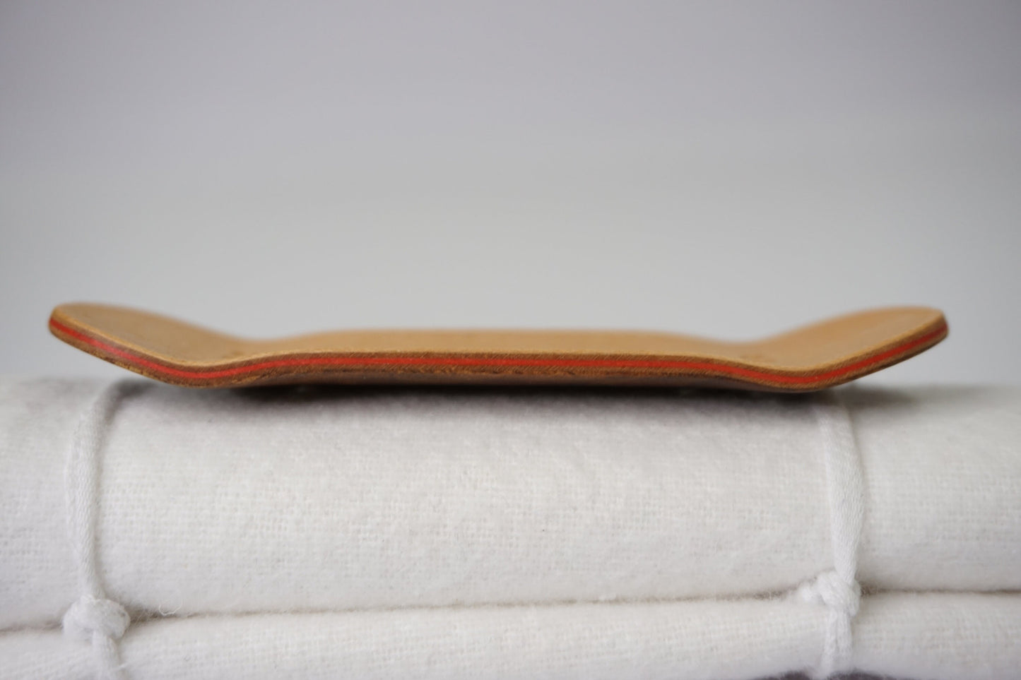 Univerque Fingerboard Deck - TraWoo Camphor Root 006 - mc_wb43_w34, symmetrical